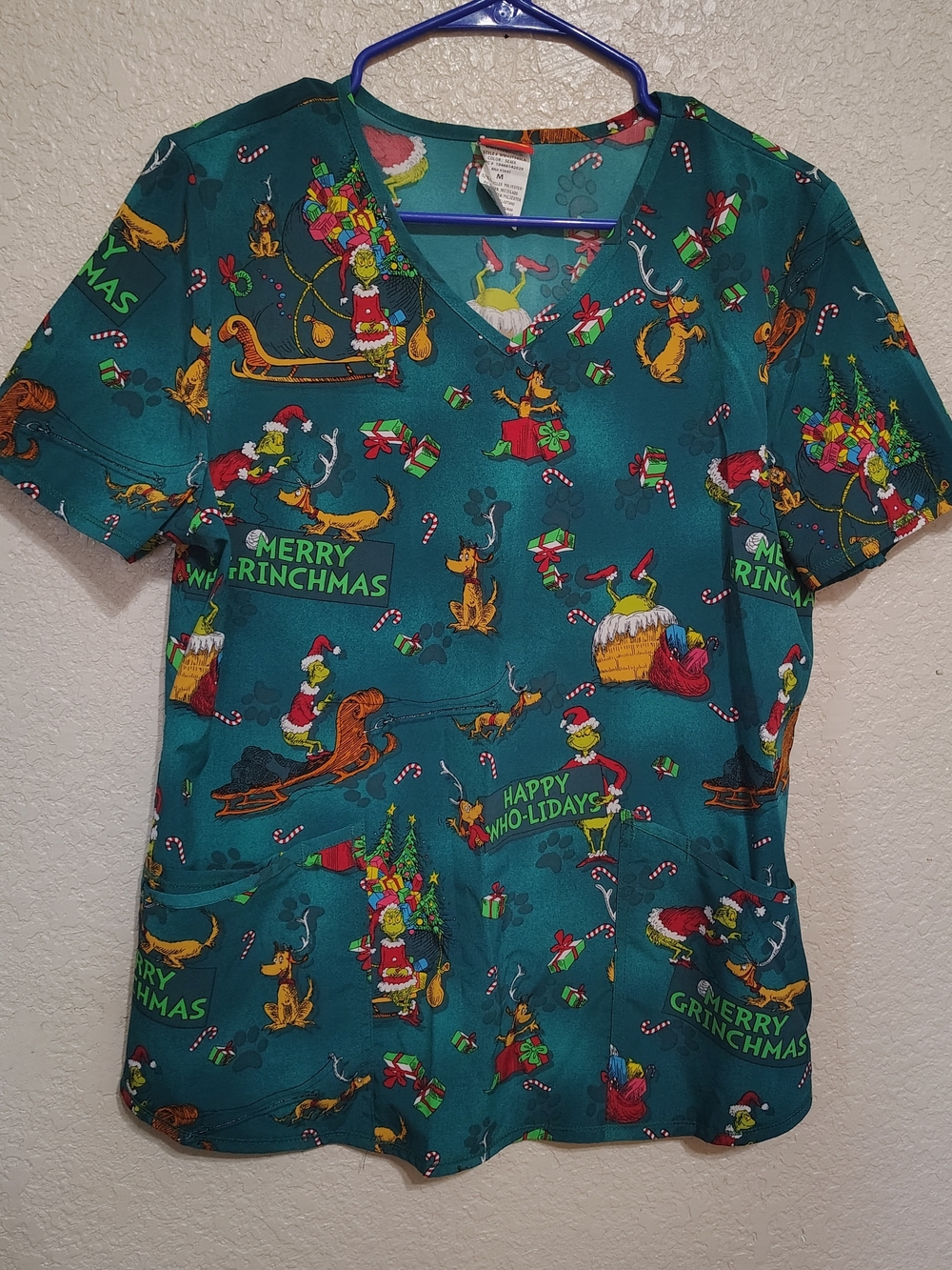 Dr. Seuss Teal Grinch Print Short Sleeve Scrub Top